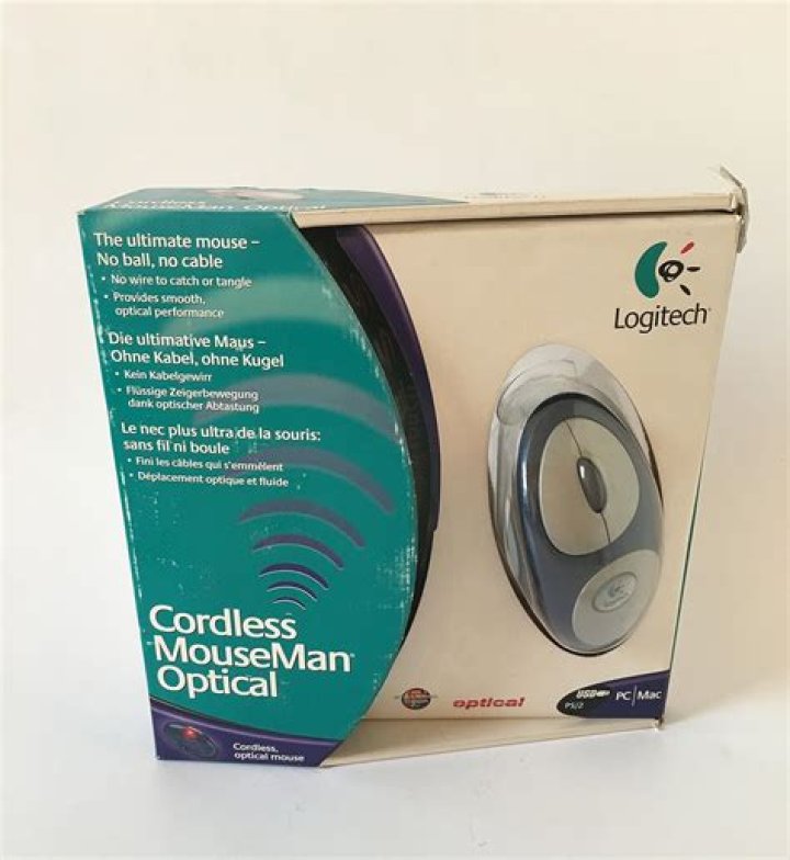 How do I pair my Logitech Cordless Optical TrackMan?