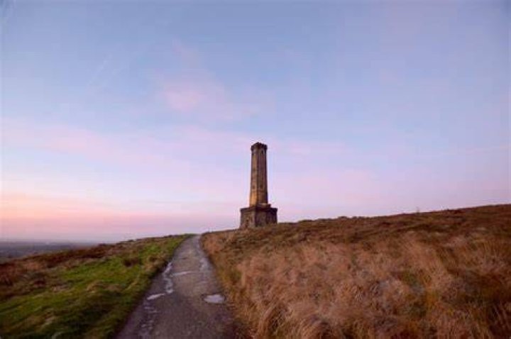 What is the tower on the hill near Ramsbottom?