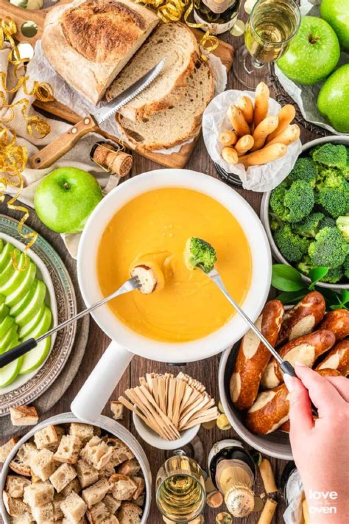 Why do you put cornstarch in cheese fondue?