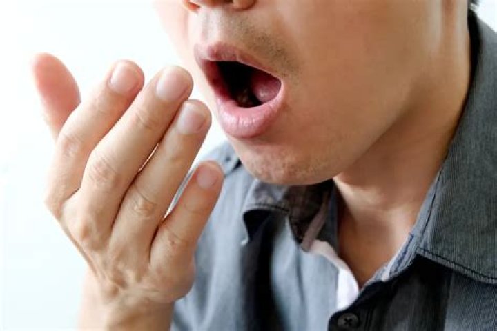 Why does my breath smell like poop?